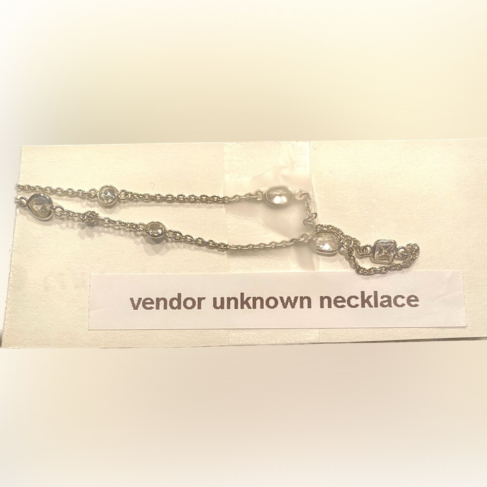 Silver necklace.